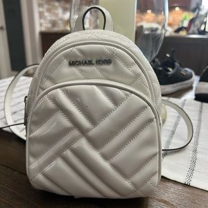 Micheal Kors mini backpack/crossbody